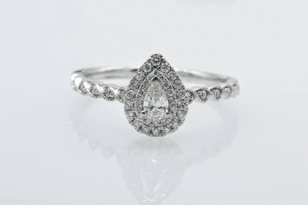 pear shaped halo engagement ring 