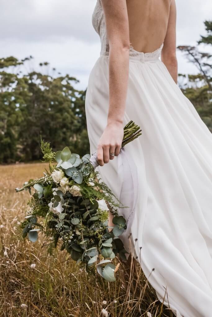 bride with vintage diamond ring holding flowers - Vintage Engagement Rings