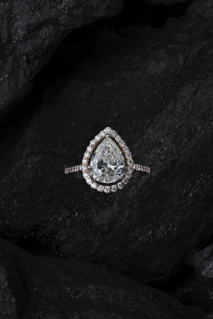 halo pear shaped diamond ring 