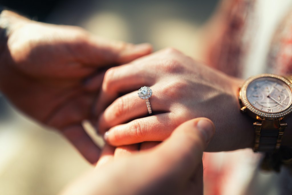 holding hands with halo diamond ring pave setting - The Pavé Setting