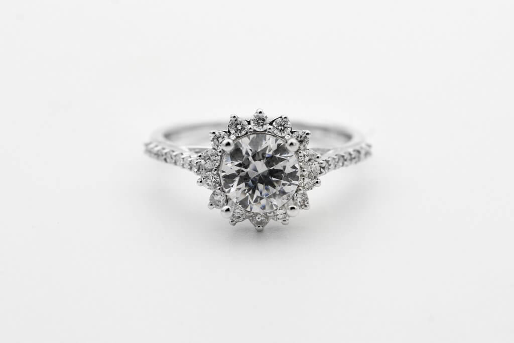 round cut diamond ring with flower shape -The Flower Setting