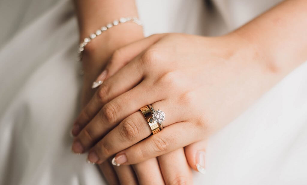 round diamond engagement ring with wedding ring