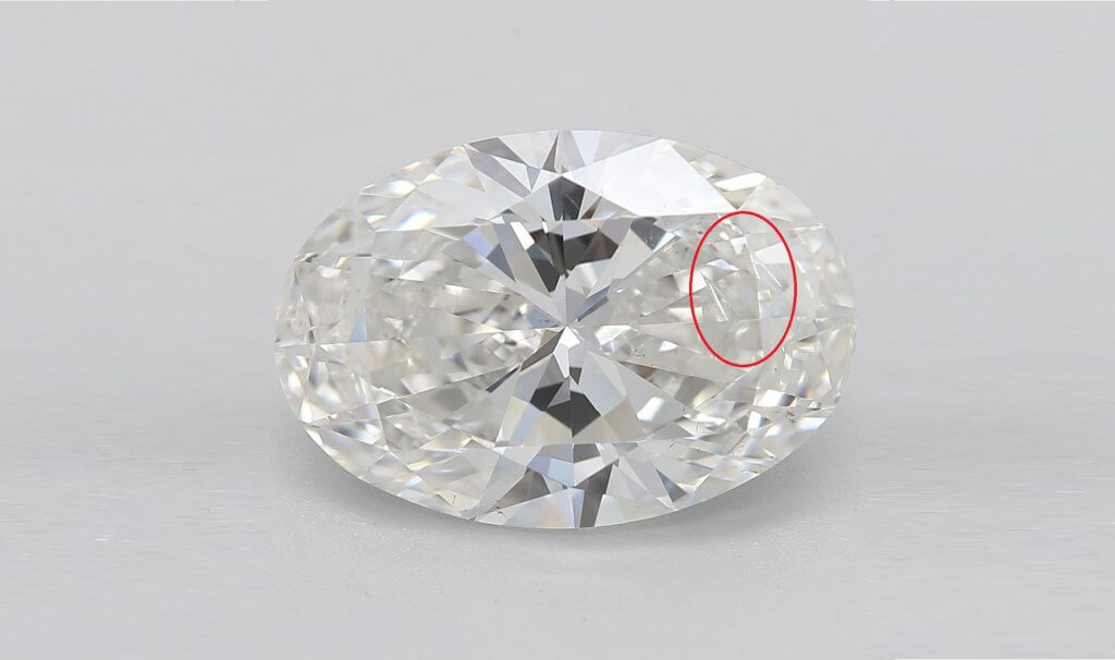 Oval 3 carat with feather inclusion