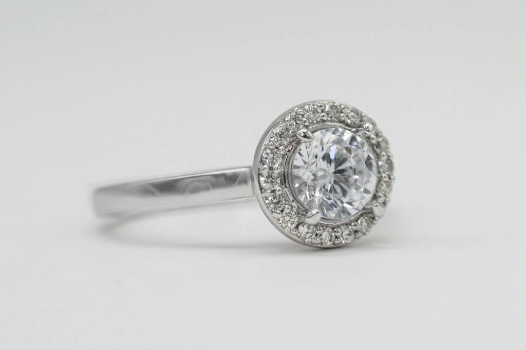 round halo diamond engagement ring hidden inclusion