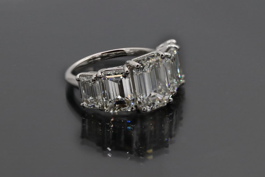 3 stone emerald cut diamond engagement ring 