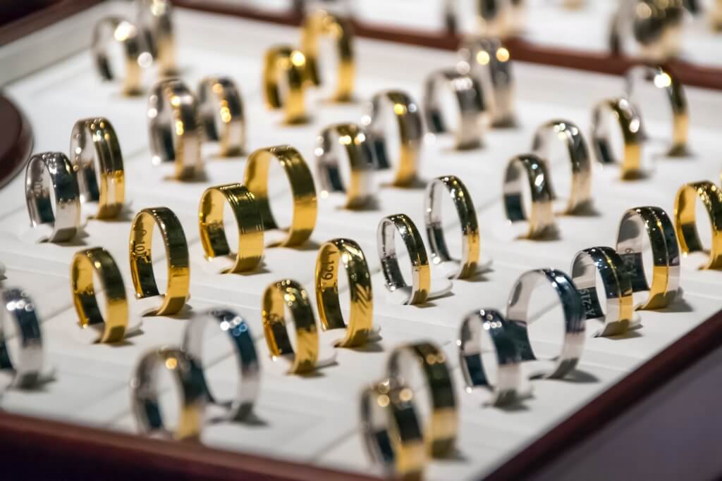 gold rings in jeweler showcase 